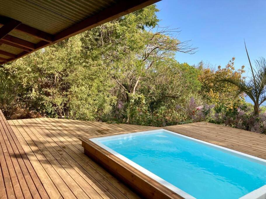 Cottage chaleureux avec vue mer et piscine Saint-Leu Extérieur photo